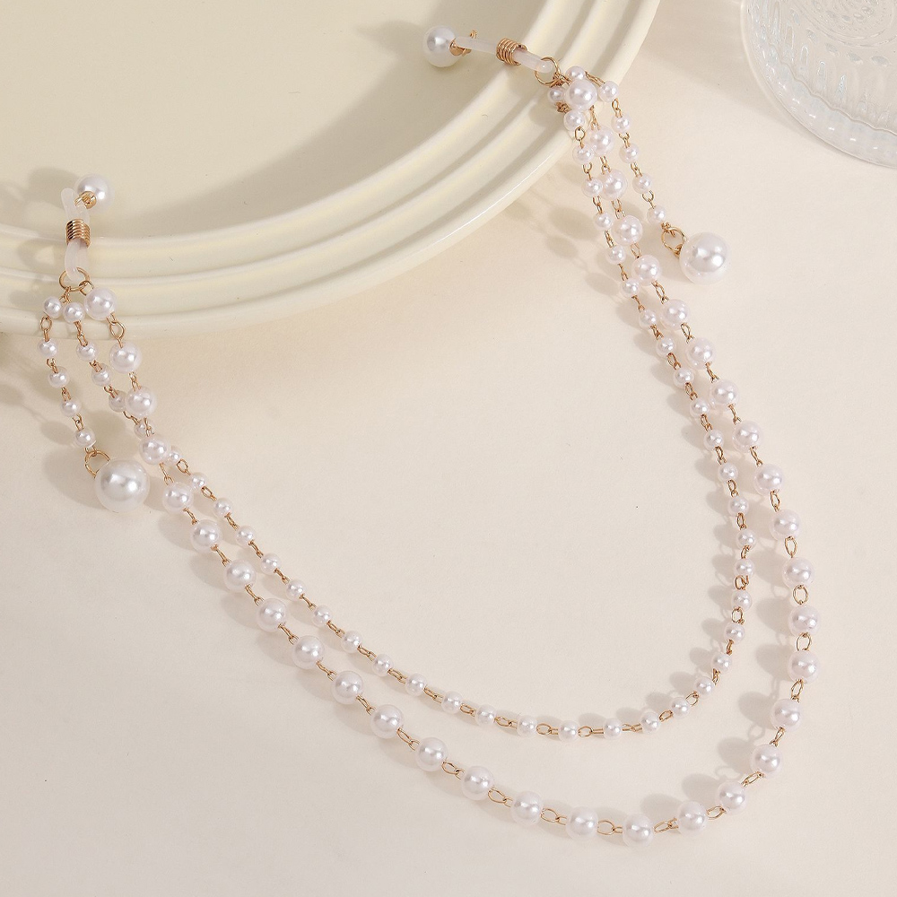 سلسلة صدرية مزينة باللؤلؤ الصن - مراجعة Body Jewelry Retainers وسعره