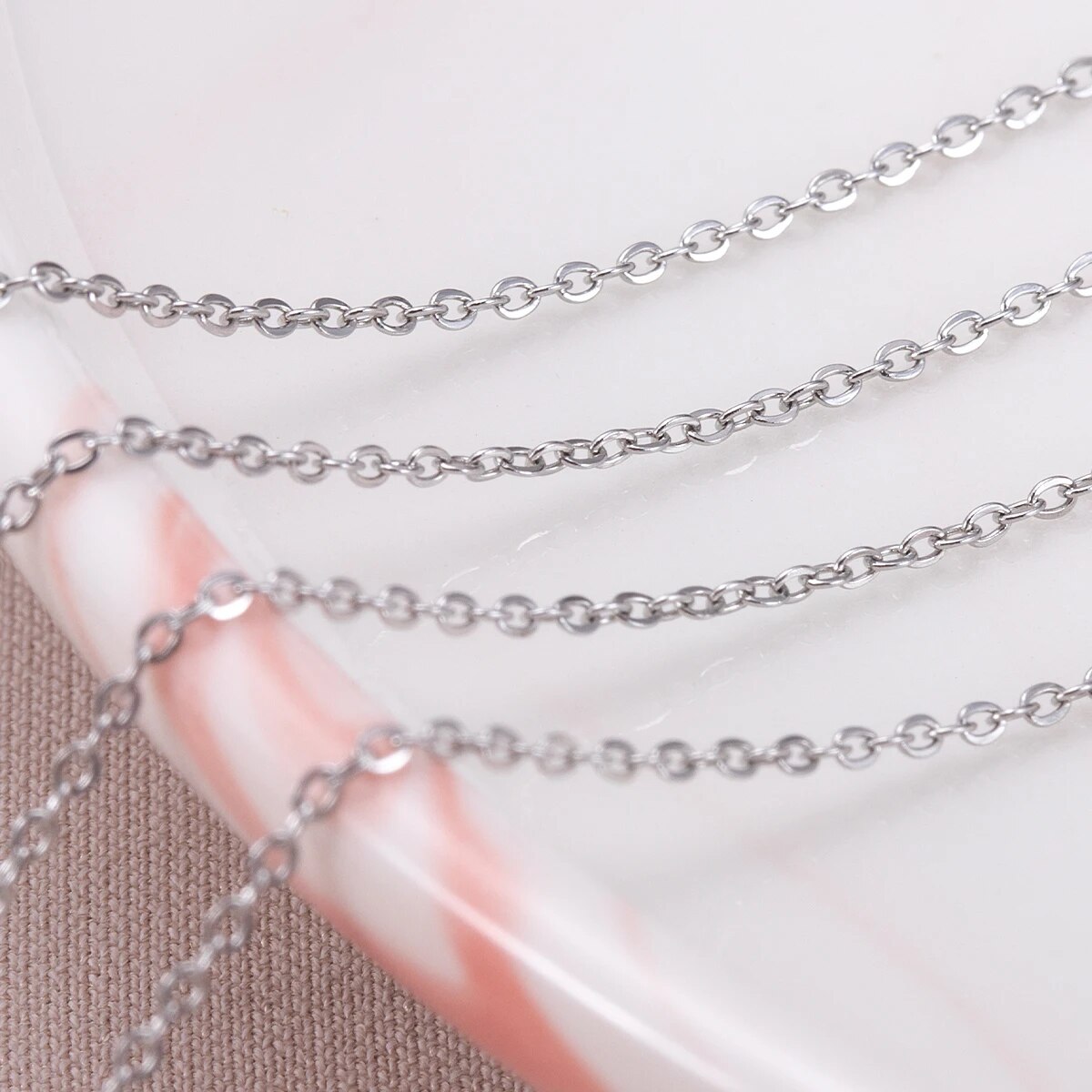 سلاسل رفيعة على شكل حرف O من ا - مراجعة Body Jewelry For You وسعره